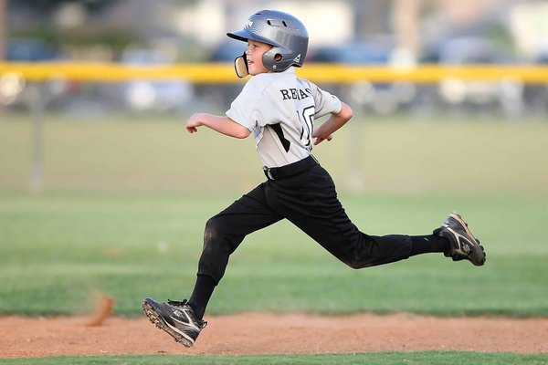 How can sports contribute to promoting physical fitness and active lifestyles among children?
